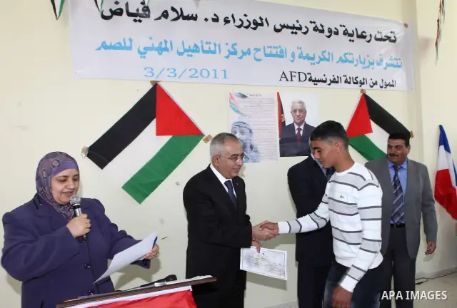 Palestinian Prime Minister Salam Fayyad, during the opening of the vocational rehabilitation centre for the Deaf in Village of Nabi Elias, in the West Bank city of Qalqilya on March 3, 2011. Photo by Mustafa Abu Dayeh