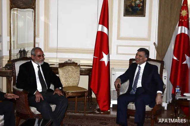 Turkish President Abdullah Gul, right, meets with Muslim Brotherhood leader Mohammed Badie in Cairo, Egypt, Thursday, March 3, 2011. Photo by Ahmed Asad