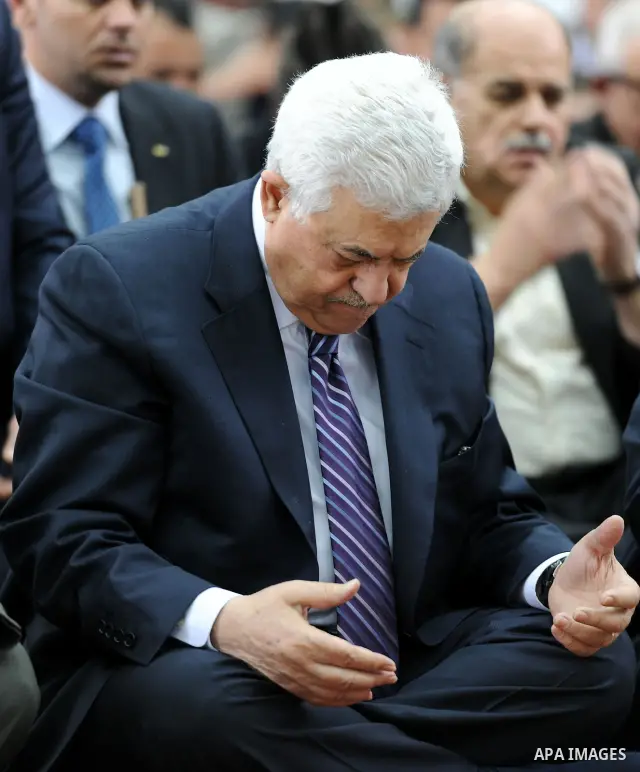 Palestinian President Mahmoud Abbas (Abu Mazen) attends Friday prayers in the West Bank city of Ramallah on March 4, 2011. Photo by Thaer Ganaim