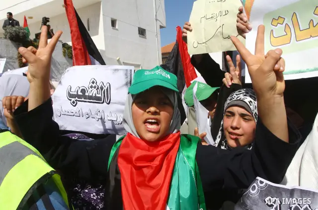 Palestinian Hamas supporters attend a Hamas rally in Gaza city, which called for an end to Palestinian divisions, March 4, 2011. Photo by Ashraf Amra
