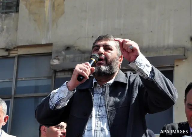 Khayrat el-Shater, the lead strategist for Egypt's largest opposition group, speaks to demonstrators at Tahrir Square in Cairo, Egypt, Friday, March 4, 2011. Egypt's new prime minister designate has vowed before thousand...