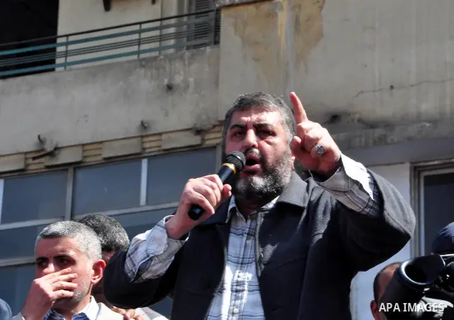 Khayrat el-Shater, the lead strategist for Egypt's largest opposition group, speaks to demonstrators at Tahrir Square in Cairo, Egypt, Friday, March 4, 2011. Egypt's new prime minister designate has vowed before thousand...