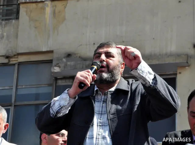 Khayrat el-Shater, the lead strategist for Egypt's largest opposition group, speaks to demonstrators at Tahrir Square in Cairo, Egypt, Friday, March 4, 2011. Egypt's new prime minister designate has vowed before thousand...