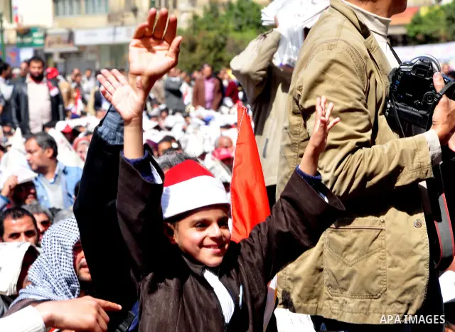 Demonstrators take part in a protest at Tahrir Square in Cairo, Egypt, Friday, March 4, 2011. Egypt's new prime minister designate has vowed before thousands of mostly young demonstrators at a central Cairo square that h...
