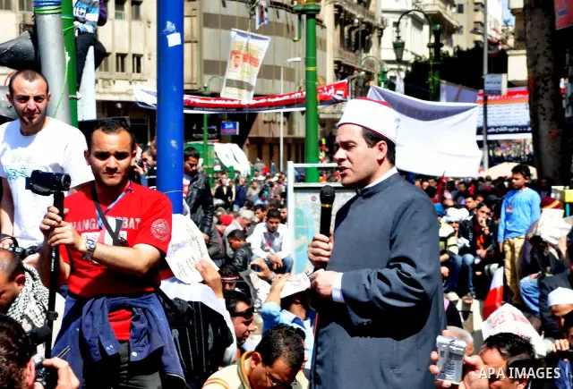 Demonstrators take part in a protest at Tahrir Square in Cairo, Egypt, Friday, March 4, 2011. Egypt's new prime minister designate has vowed before thousands of mostly young demonstrators at a central Cairo square that h...