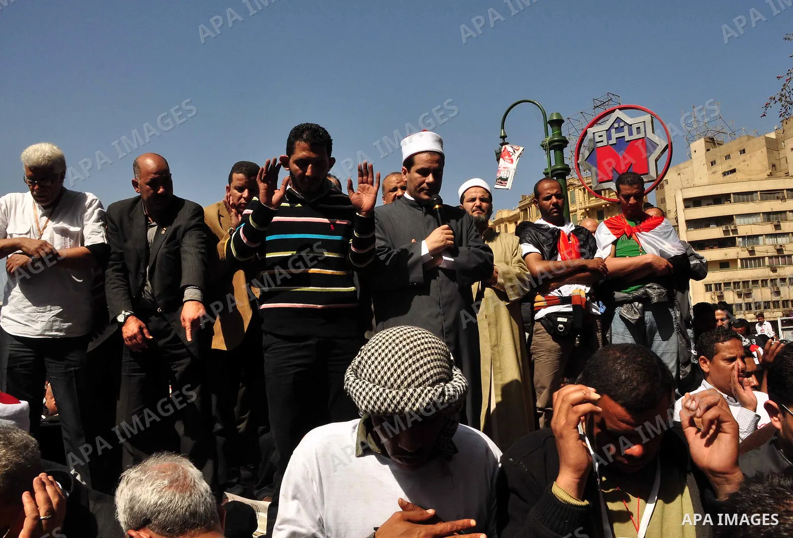 Demonstrators take part in a protest at Tahrir Square in Cairo, Egypt, Friday, March 4, 2011. Egypt's new prime minister designate has vowed before thousands of mostly young demonstrators at a central Cairo square that h...