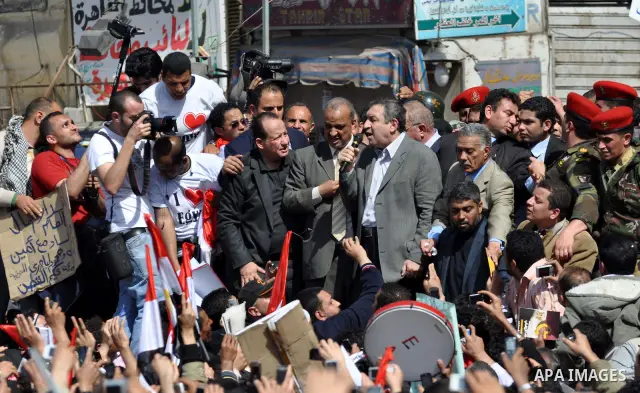 Egyptian Prime Minister designate Essam Sharaf, speaks to demonstrators at Tahrir Square in Cairo, Egypt, Friday, March 4, 2011. Egypt's new prime minister designate has vowed before thousands of mostly young demonstrato...