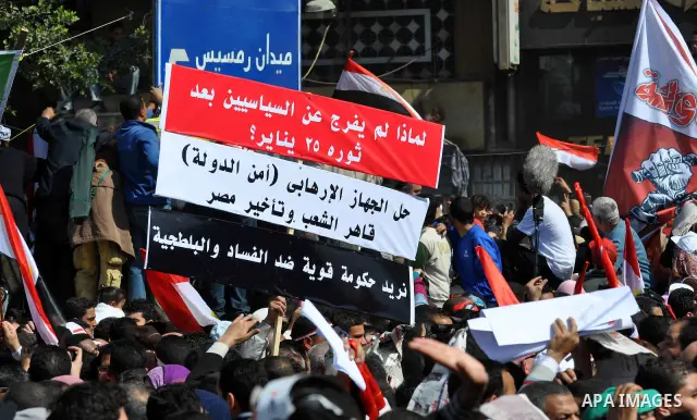 Demonstrators take part in a protest at Tahrir Square in Cairo, Egypt, Friday, March 4, 2011. Egypt's new prime minister designate has vowed before thousands of mostly young demonstrators at a central Cairo square that h...