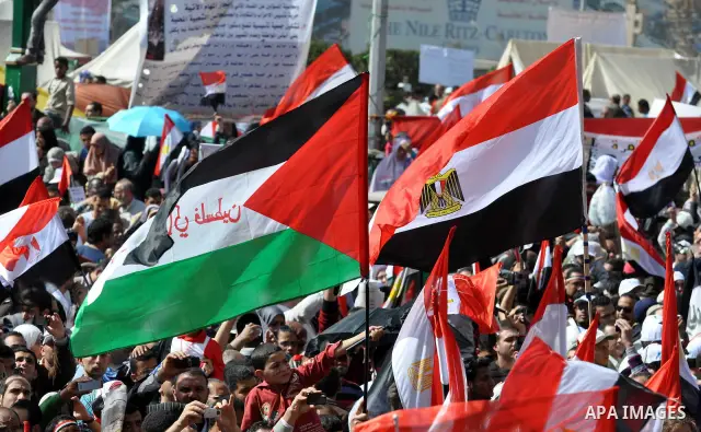 Demonstrators take part in a protest at Tahrir Square in Cairo, Egypt, Friday, March 4, 2011. Egypt's new prime minister designate has vowed before thousands of mostly young demonstrators at a central Cairo square that h...