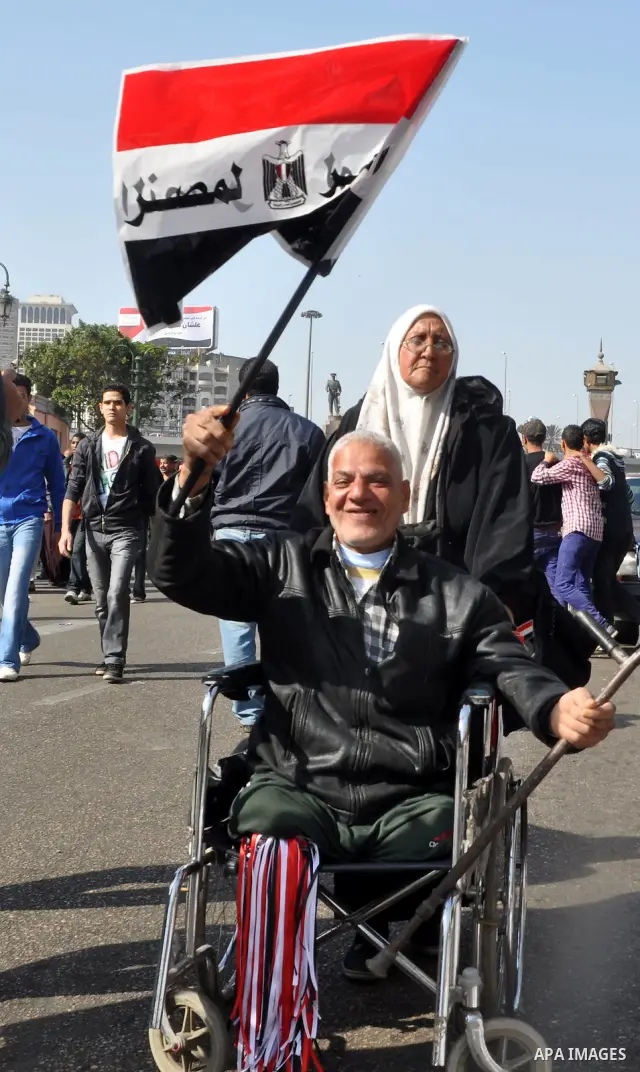 Demonstrators take part in a protest at Tahrir Square in Cairo, Egypt, Friday, March 4, 2011. Egypt's new prime minister designate has vowed before thousands of mostly young demonstrators at a central Cairo square that h...