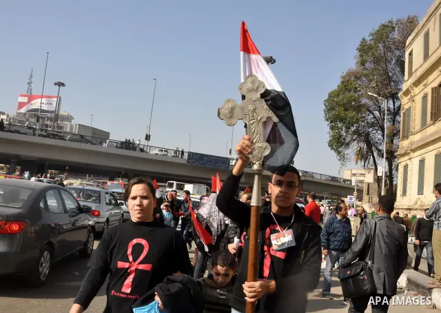 Demonstrators take part in a protest at Tahrir Square in Cairo, Egypt, Friday, March 4, 2011. Egypt's new prime minister designate has vowed before thousands of mostly young demonstrators at a central Cairo square that h...