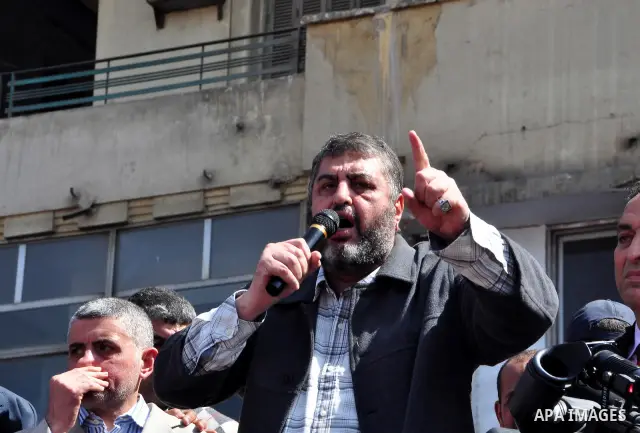 Khayrat el-Shater, the lead strategist for Egypt's largest opposition group, speaks to demonstrators at Tahrir Square in Cairo, Egypt, Friday, March 4, 2011. Egypt's new prime minister designate has vowed before thousand...