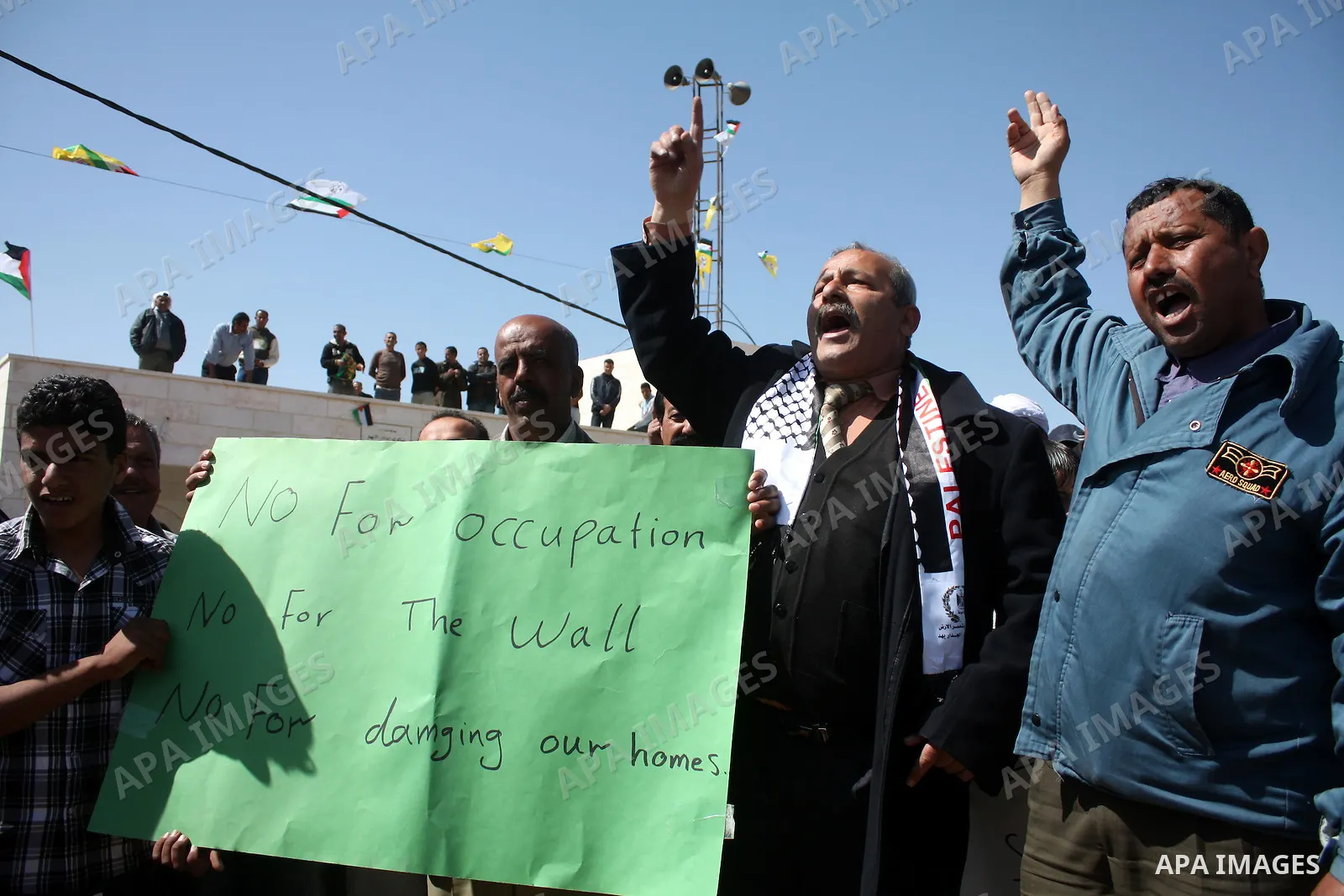 Palestinian take part during demonstration against the decision from Israeli authorities to demolish the mosque ,school and against Israel's controversial separation barrier and calling for the national reconciliation in...