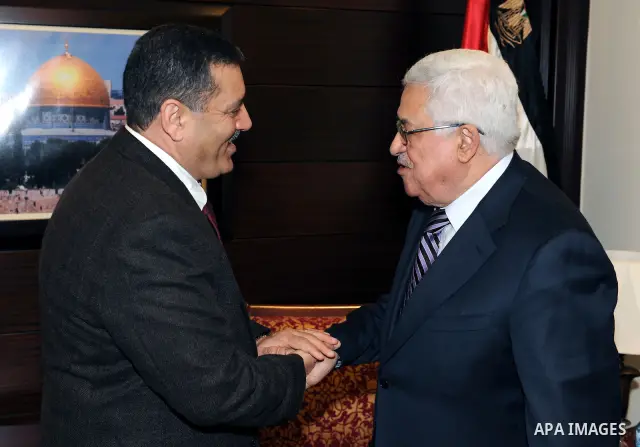 Palestinian President Mahmoud Abbas (Abu Mazen) during a meeting with Tunisian Ambassador, Chakib Azwadi in the West Bank city of Ramallah on March 4, 2011. Photo by Thaer Ganaim