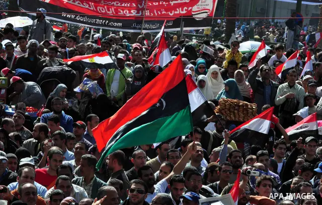 Demonstrators take part in a protest at Tahrir Square in Cairo, Egypt, Friday, March 4, 2011. Egypt's new prime minister designate has vowed before thousands of mostly young demonstrators at a central Cairo square that h...