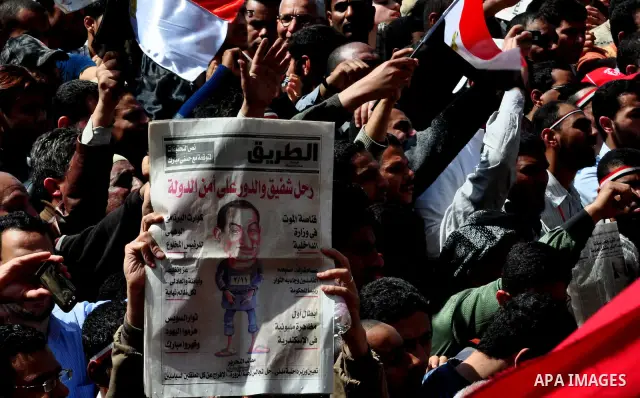 Demonstrators take part in a protest at Tahrir Square in Cairo, Egypt, Friday, March 4, 2011. Egypt's new prime minister designate has vowed before thousands of mostly young demonstrators at a central Cairo square that h...