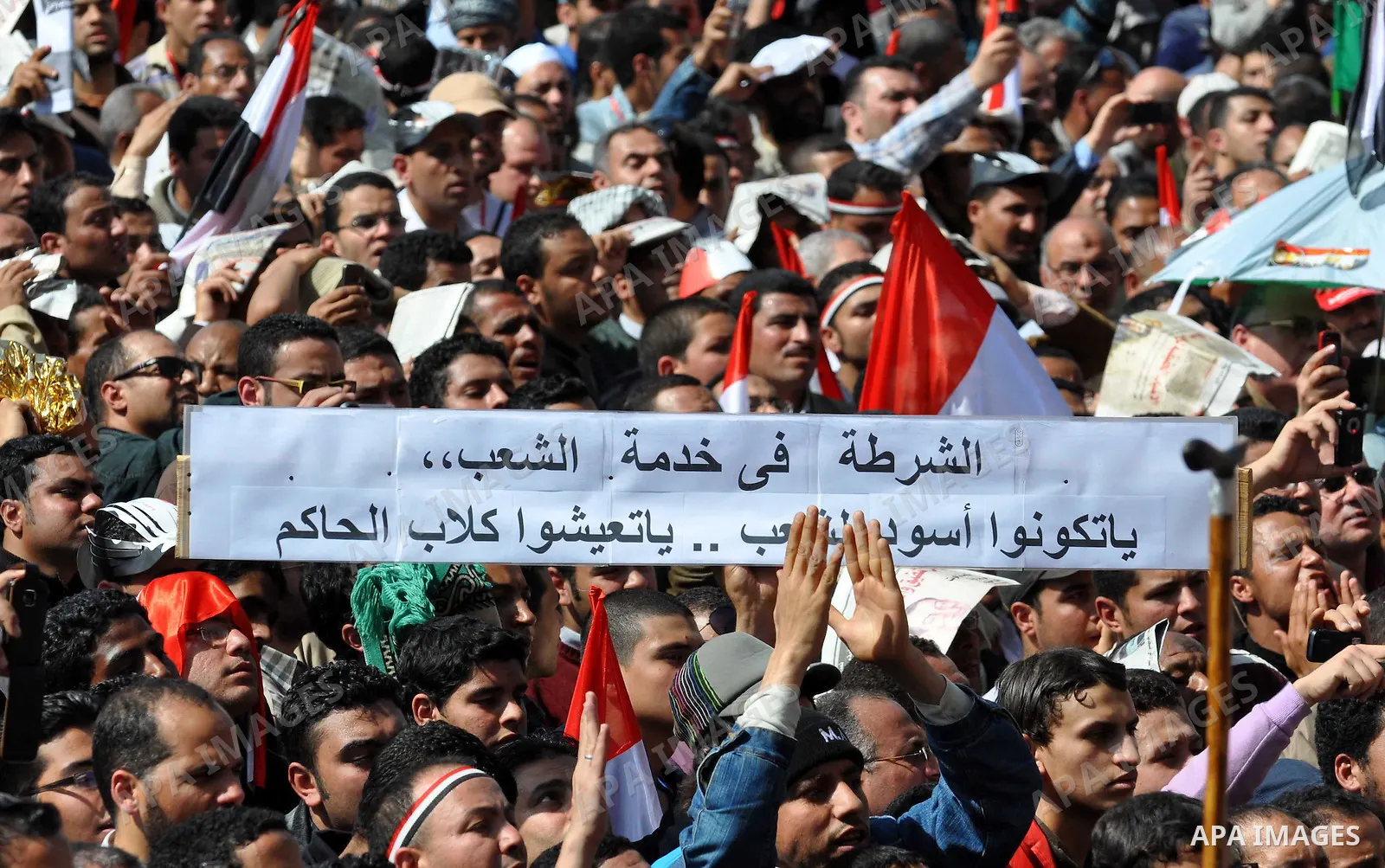 Demonstrators take part in a protest at Tahrir Square in Cairo, Egypt, Friday, March 4, 2011. Egypt's new prime minister designate has vowed before thousands of mostly young demonstrators at a central Cairo square that h...