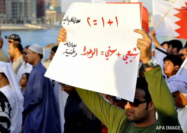 Tens of thousands of Bahraini anti-government protesters march Friday, March 4, 2011, from the main government house in the capital of Manama, Bahrain, to the Pearl roundabout, where they have set up camp. Also on Friday...