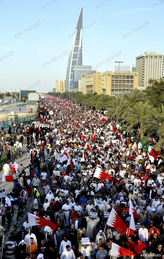 Tens of thousands of Bahraini anti-government protesters march Friday, March 4, 2011, from the main government house in the capital of Manama, Bahrain, to the Pearl roundabout, where they have set up camp. Also on Friday...