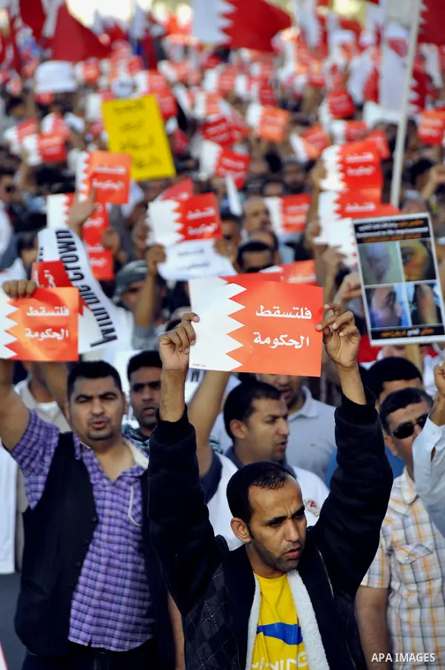 Tens of thousands of Bahraini anti-government protesters march Friday, March 4, 2011, from the main government house in the capital of Manama, Bahrain, to the Pearl roundabout, where they have set up camp. Also on Friday...