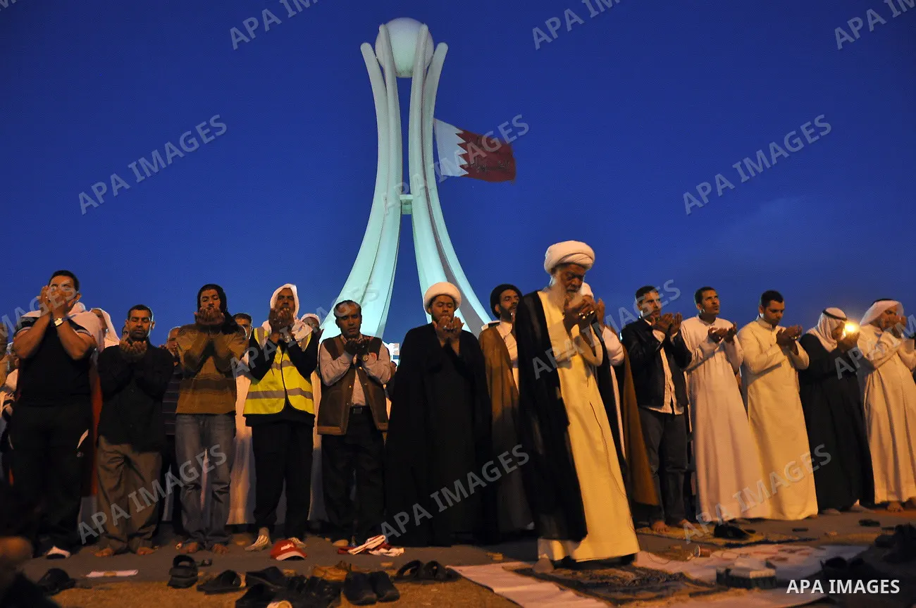 Tens of thousands of Bahraini anti-government protesters march Friday, March 4, 2011, from the main government house in the capital of Manama, Bahrain, to the Pearl roundabout, where they have set up camp. Also on Friday...