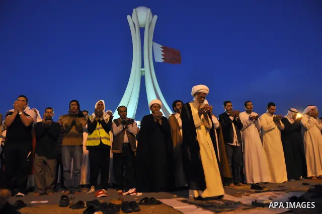 Tens of thousands of Bahraini anti-government protesters march Friday, March 4, 2011, from the main government house in the capital of Manama, Bahrain, to the Pearl roundabout, where they have set up camp. Also on Friday...
