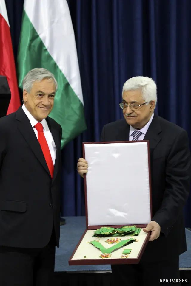 Palestinian President Mahmoud Abbas and the Chile's President Sebastian Pinera attend a press conference in the West Bank town of Ramallah on March 5,2011. In the second day visit of Pinera that will also take him to Bet...