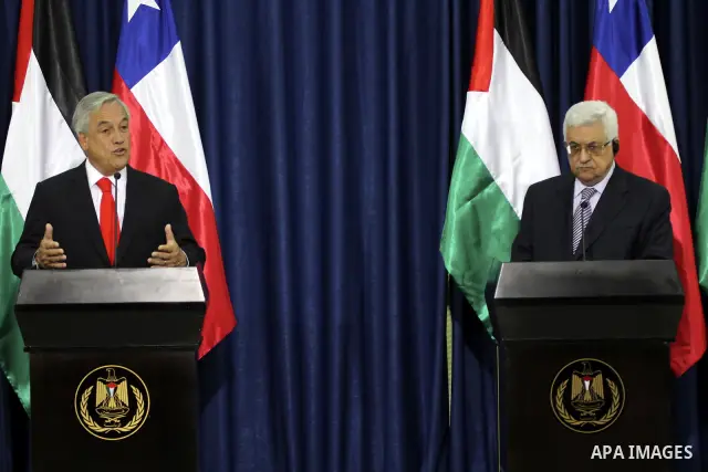 Palestinian President Mahmoud Abbas and the Chile's President Sebastian Pinera attend a press conference in the West Bank town of Ramallah on March 5,2011. In the second day visit of Pinera that will also take him to Bet...
