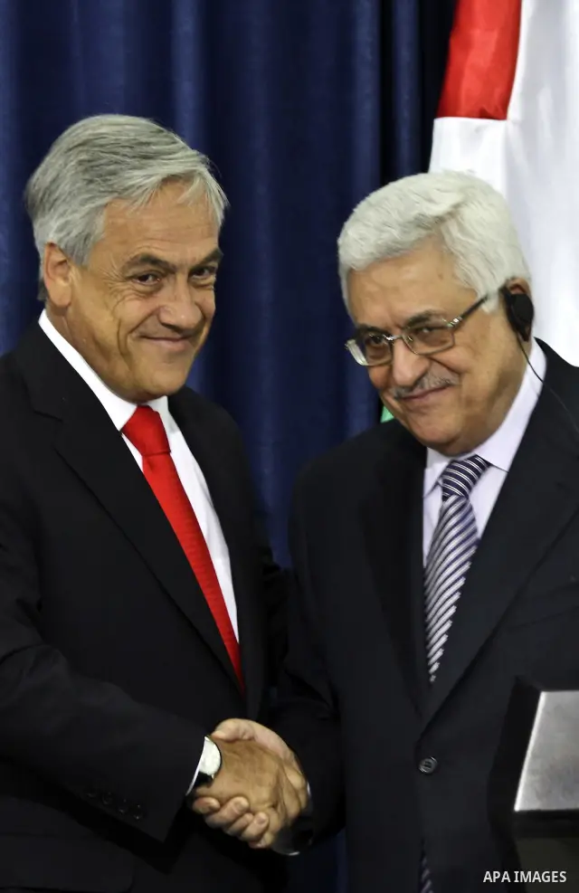 Palestinian President Mahmoud Abbas and the Chile's President Sebastian Pinera attend a press conference in the West Bank town of Ramallah on March 5,2011. In the second day visit of Pinera that will also take him to Bet...