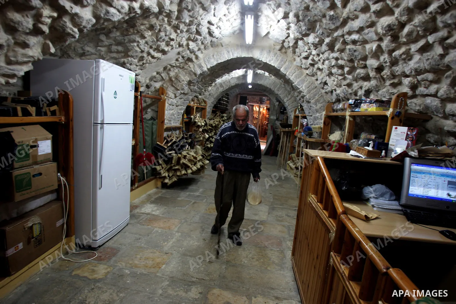 Palestinian blind men work in making brooms at a workshop in the Old City of Jerusalem on March 5,2011. The workshop is owned and managed by the Arab Blind Association, which was founded by blind Palestinians in 1932, an...