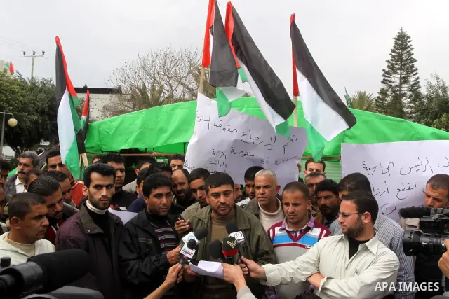 Palestinians take part in a protest calling the Presidet Mahmoud Abbas to return their salaries, in Gaza city on March 6,2011. Photo by Mohammed Asad