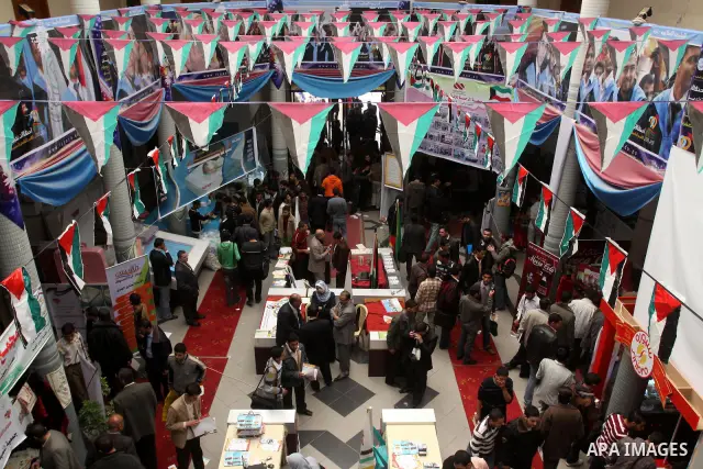 Palestinians participate in the second exhibition for the national agricultural and industrial products at the Islamic University, in Gaza city on March 6,2011. Photo by Mohammed Asad
