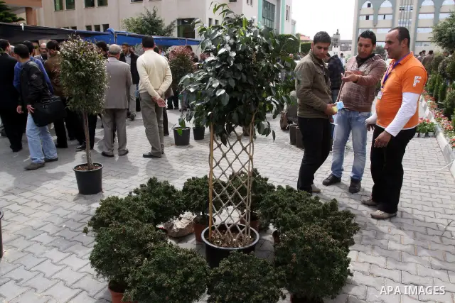 Palestinians participate in the second exhibition for the national agricultural and industrial products at the Islamic University, in Gaza city on March 6,2011. Photo by Mohammed Asad
