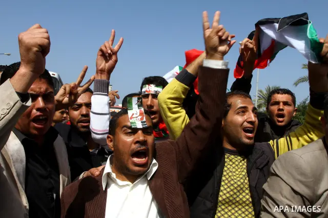 Palestinians shout slogans during a protest in Gaza City calling for unity between the Hamas Islamist group and its bitter West Bank rival Fatah party, on March 7, 2011, a day after Hamas police detained several proteste...