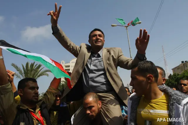 Palestinians shout slogans during a protest in Gaza City calling for unity between the Hamas Islamist group and its bitter West Bank rival Fatah party, on March 7, 2011, a day after Hamas police detained several proteste...