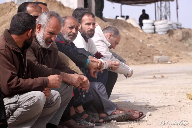 Palestinians participate in a protest against the Israeli decision to close the Karni crossing in the eastern Gaza city on March 07, 2011 . Photo by Mohammed Asad
