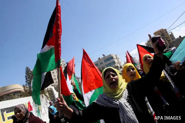 Palestinian women attend a rally calling for an end to Palestinian divisions, to mark International Women's Day in Gaza City March 8, 2011. Female protesters rallied to voice their frustrations over the unending split be...