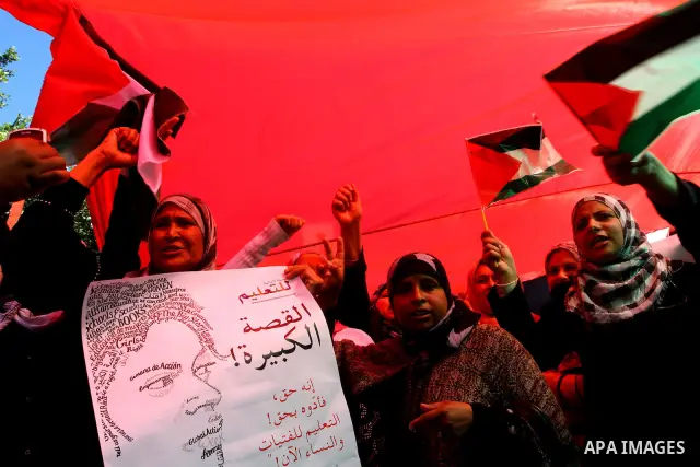 Palestinian women attend a rally calling for an end to Palestinian divisions, to mark International Women's Day in Gaza City March 8, 2011. Female protesters rallied to voice their frustrations over the unending split be...
