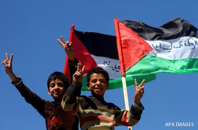 Palestinian women attend a rally calling for an end to Palestinian divisions, to mark International Women's Day in Gaza City March 8, 2011. Female protesters rallied to voice their frustrations over the unending split be...