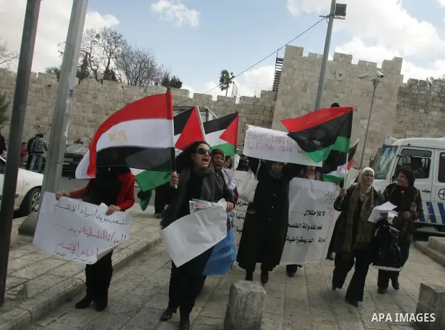 Palestinian women demonstrate against Israel during a women's day protest at Damascus Gate in Jerusalem's Old City on March 8,2011. Photo by Mahfouz Abu Turk