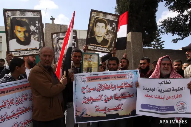 Palestinian jailed relatives take part in a protest calling for the release of Palestinian prisoners from Egyptian jails in front of the Egyptian Embassy in Gaza City on March 9,2011. Photo by Mohammed Asad