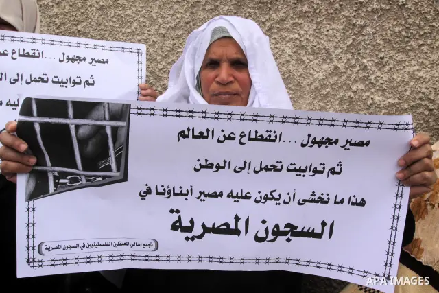 Palestinian jailed relatives take part in a protest calling for the release of Palestinian prisoners from Egyptian jails in front of the Egyptian Embassy in Gaza City on March 9,2011. Photo by Mohammed Asad