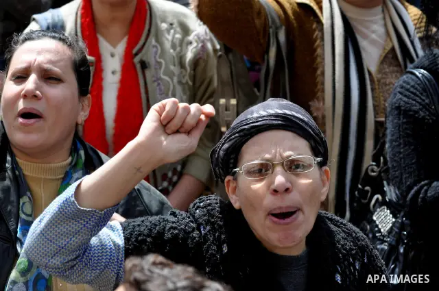 Egyptian Coptic Christians take part in a protest in front of the Information center building in Cairo, Egypt, 09 March 2011. The Coptic Christians were protesting over the burning of a church in Cairo suburbs on 04 Marc...