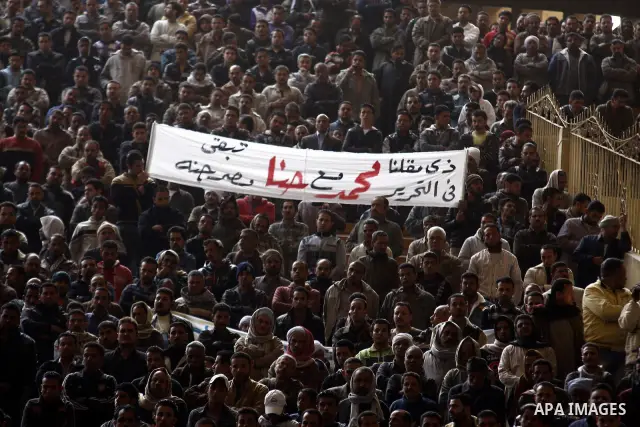 Egyptian Coptic Christians gather for a mass funeral procession at the Samaan el-Kharaz Church in Cairo on March 10, 2011 after at least 13 people were killed in sectarian clashes which erupted when 1,000 Christians gath...