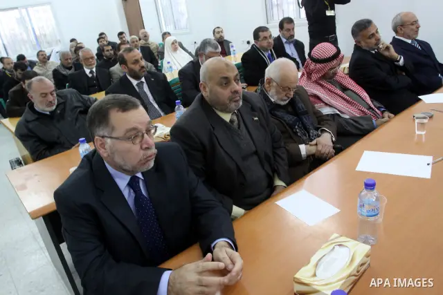 Palestinian Legislative Council members participate in a meeting to discuss the new government headed by Ismail Haneiyah in Gaza city on March 10,2011. Photo by Mohammed Asad