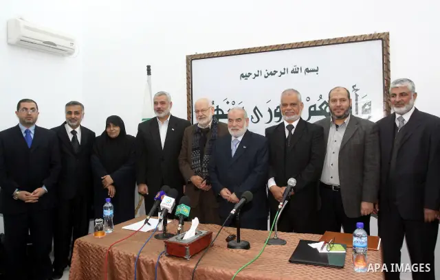 Palestinian Legislative Council members participate in a meeting to discuss the new government headed by Ismail Haneiyah in Gaza city on March 10,2011. Photo by Mohammed Asad
