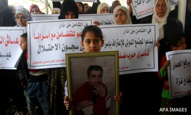 Palestinian women take part in a demonstration organized by the Democratic Front for the Liberation of Palestine (DFLP), calling to end the Palestinian internal division between Hamas and Fatah, outside the International...