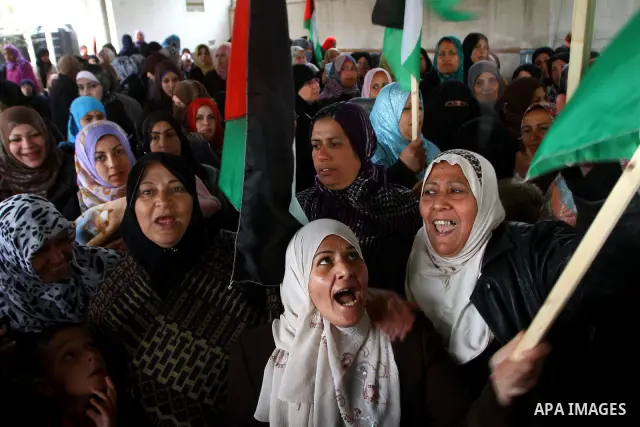 Palestinian women take part in a demonstration organized by the Democratic Front for the Liberation of Palestine (DFLP), calling to end the Palestinian internal division between Hamas and Fatah, outside the International...