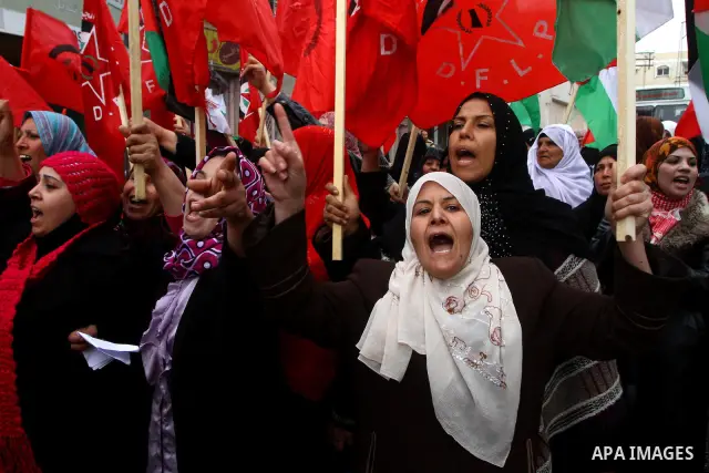 Palestinian women take part in a demonstration organized by the Democratic Front for the Liberation of Palestine (DFLP), calling to end the Palestinian internal division between Hamas and Fatah, outside the International...