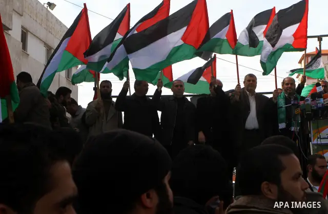 Palestinians attend a rally calling for national reconciliation between the rival Palestinian leading factions Hamas in Gaza and Fatah in the West Bank, in Gaza City, Friday, March 11, 2011. Members of major Palestinian...